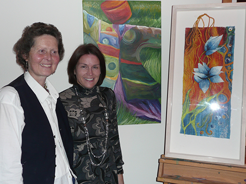 Regina Glynn and Valerie O' Sullivan and two paintings